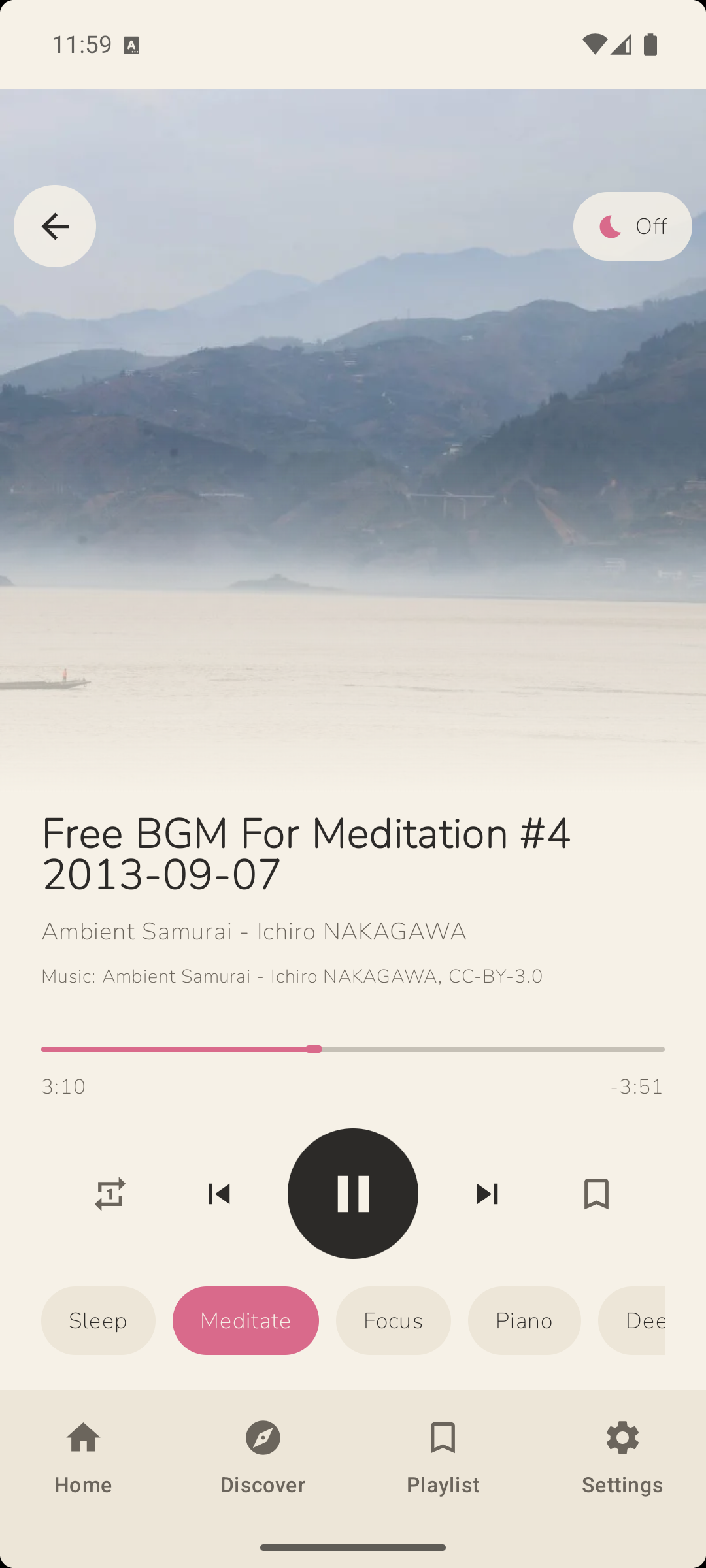 Calmink playing a meditation piece over misty mountains